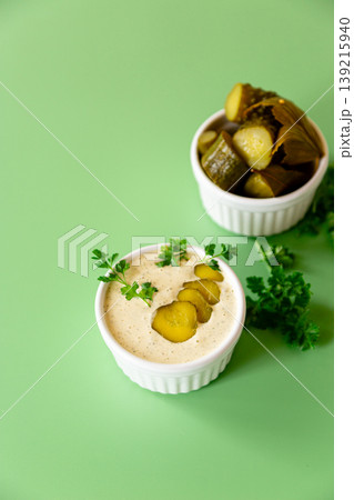 traditional tartar sauce served in ceramic ramekin with garnish 139215940