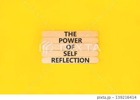 Self reflection symbol. Concept words The power of self reflection on beautiful wooden sticks. Beautiful yellow paper background. Business the power of self reflection concept. Copy space. 139216414