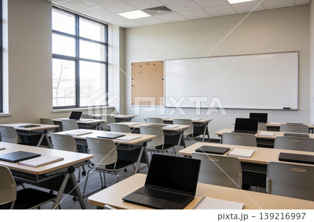 Modern empty classroom with laptops and whiteboard ready for learning and teaching 139216997