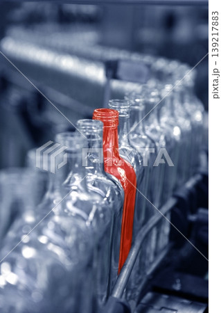 Different unique red bottle in factory line Different unique red bottle in factory line 139217883