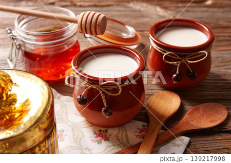 Curd dairy dessert with honey 139217998