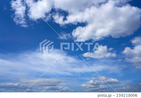 Blue sky white summer cumulus clouds 139218006