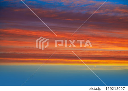 Sunset clouds sky in orange and blue Sunset clouds sky in orange and blue 139218007