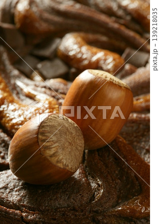 Hazelnuts and chocolate Hazelnuts and chocolate 139218035