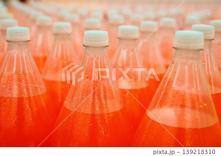 orange juice beverage plastic bottle in factory orange juice beverage plastic bottle in factory 139218310