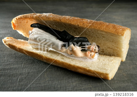 wedding figurine in a bread sandwich wedding figurine in a bread sandwich 139218316