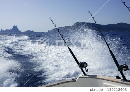 Blue Mediterranean fishing boat rod and reels Blue Mediterranean fishing boat rod and reels 139218408