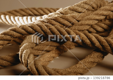 Old brown golden rough rope macro detail Old brown golden rough rope macro detail 139218786