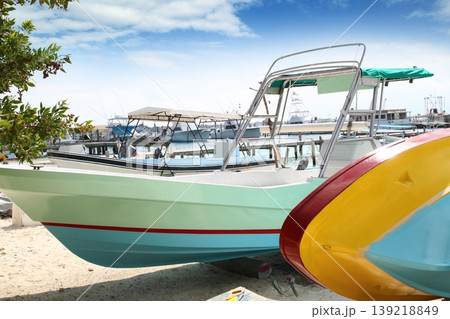 boats colorful in Isla Mujeres beach Mexico 139218849