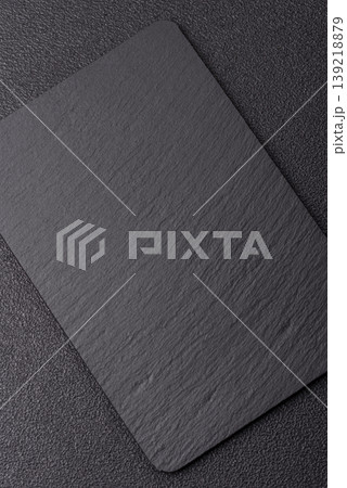 A blank slate board on a dark background for Asian food. A blank slate board A blank slate board on a dark background for Asian food. A blank slate board 139218879