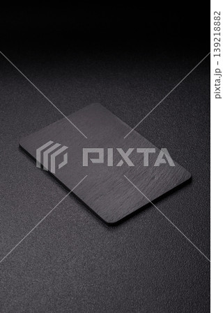 A blank slate board on a dark background for Asian food. A blank slate board A blank slate board on a dark background for Asian food. A blank slate board 139218882