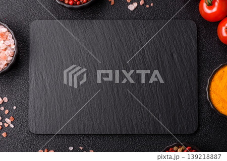 A blank slate board on a dark background for Asian food. A blank slate board A blank slate board on a dark background for Asian food. A blank slate board 139218887