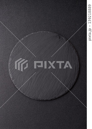 A blank slate board on a dark background for Asian food. A blank slate board 139218889