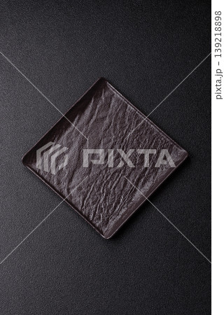 A blank slate board on a dark background for Asian food. A blank slate board A blank slate board on a dark background for Asian food. A blank slate board 139218898