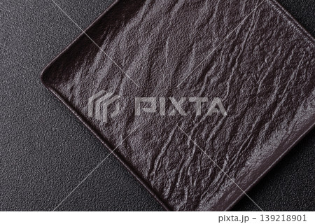 A blank slate board on a dark background for Asian food. A blank slate board A blank slate board on a dark background for Asian food. A blank slate board 139218901