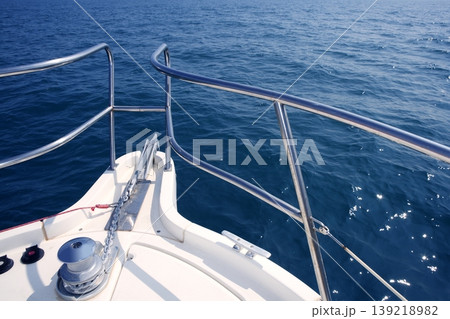 boat bow sailing sea with anchor chain winch 139218982