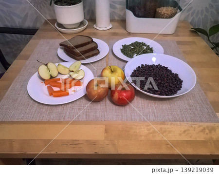Healthy Raw Food Assortment on Wooden Table Healthy Raw Food Assortment on Wooden Table 139219039