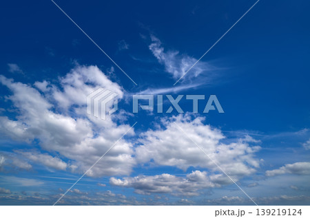 Blue sky white summer cumulus clouds 139219124