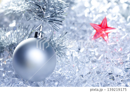 christmas baubles silver on winter ice 139219175