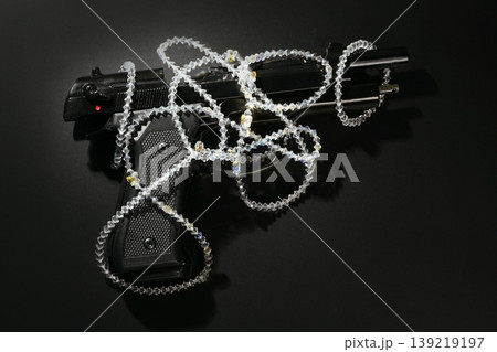 Gun and jewels over black, classic mafia image Gun and jewels over black, classic mafia image 139219197