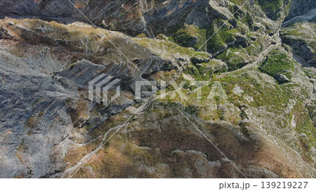 Mountain canyon with rocky cliffs and green forest Mountain canyon with rocky cliffs and green forest 139219227