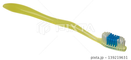 Plastic yellow toothbrush on isolated background Plastic yellow toothbrush on isolated background 139219631