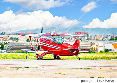 Airplane, red light aerobatic biplane. Air shows. Airplane, red light aerobatic biplane. Air shows. 139219656