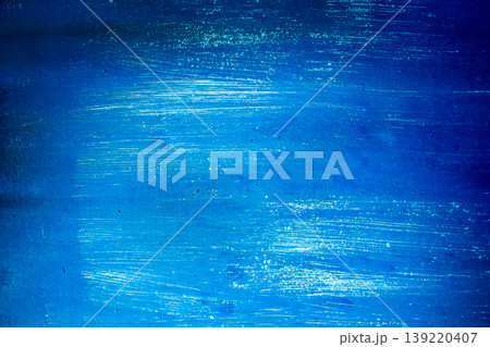 Blue paint grunge wall texture abstract white pattern cold background spot light backdrop vignette Blue paint grunge wall texture abstract white pattern cold background spot light backdrop vignette 139220407
