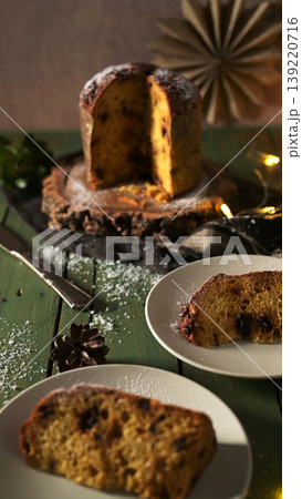 Italian Panettone Loaf with Slices and Powdered Sugar Italian Panettone Loaf with Slices and Powdered Sugar 139220716