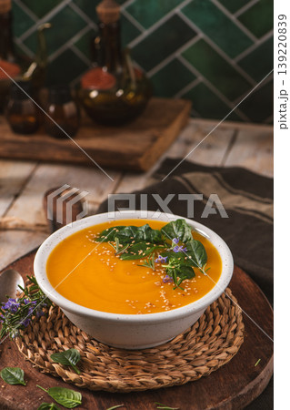 Creamy Pumpkin Soup with Spinach and Sesame Seeds Creamy Pumpkin Soup with Spinach and Sesame Seeds 139220839