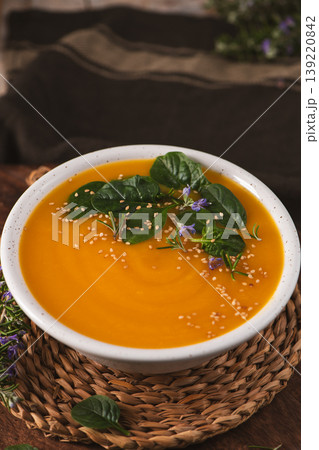 Creamy Pumpkin Soup with Spinach and Sesame Seeds 139220842