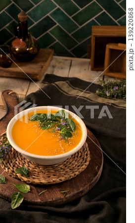 Healthy Pumpkin Soup with Spinach and Sesame Garnish Healthy Pumpkin Soup with Spinach and Sesame Garnish 139220868