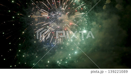 Green Firework celebrate anniversary happy new year 2023, 4th of july holiday festival. Green firework in night time celebrate national holiday. Countdown to new year 2023 festival party time event 139221089