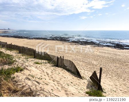 Scenic View of Praia da Granja Beach with Sand Dunes and Wooden Fencing in Porto Portugal 139221190