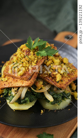 Pan Seared Tofu Steaks with Sauteed Greens and Crumbled Breadcrumbs Pan Seared Tofu Steaks with Sauteed Greens and Crumbled Breadcrumbs 139221192