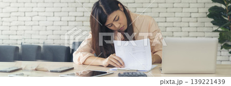 Banner Businesswoman reading financial graph charts business info with computer laptop. Panorama Women hands using laptop on office desk. Hands of business woman working office with copy space Banner Businesswoman reading financial graph charts business info with computer laptop. Panorama Women hands using laptop on office desk. Hands of business woman working office with copy space 139221439
