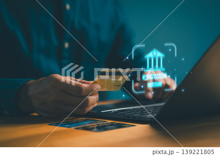 Secure online banking and digital finance concept with man using credit card for internet payment, login on laptop technology for e-commerce transactions. Secure online banking and digital finance concept with man using credit card for internet payment, login on laptop technology for e-commerce transactions. 139221805