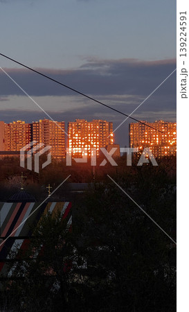 Captivating sunset light reflecting on urban architecture. 139224591