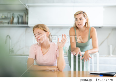 Angry mother yells at teenage girl sad daughter 139225776