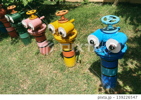 Colorful Fire Hydrants in a Row Colorful Fire Hydrants in a Row 139226547