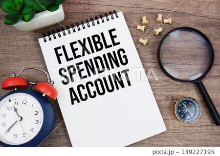 Flexible Spending Account text written on notepad with alarm clock, compass and magnifying glass flat lay on wooden background Flexible Spending Account text written on notepad with alarm clock, compass and magnifying glass flat lay on wooden background 139227195