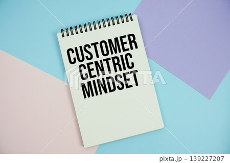 Customer Centric Mindset text written on notepad flat lay on multicolor pastel background Customer Centric Mindset text written on notepad flat lay on multicolor pastel background 139227207