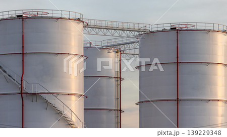 Oil storage tank, White Oil storage fuel tank with oil pipeline system in petrol industry, Oil storage tank at oil and gas refinery industrial zone. 139229348