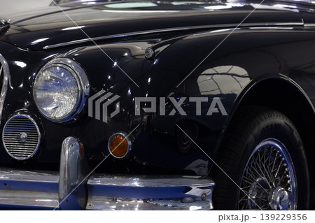 Headlights on classic car, Vintage car headlight, Classic retro car with close-up on headlight. Headlights on classic car, Vintage car headlight, Classic retro car with close-up on headlight. 139229356