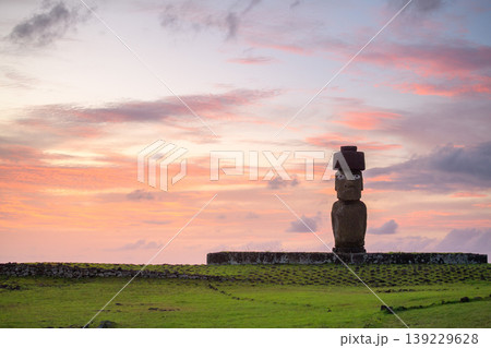 Peaceful moai statue stands on serene easter island chile at sunset 139229628