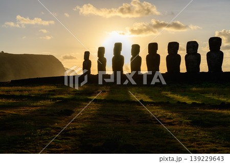 Majestic silhouette of moai statue during easter island chile sunset 139229643