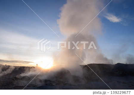 Awe inspiring sunrise at Sol de Manana geyser with volcanic steam 139229677