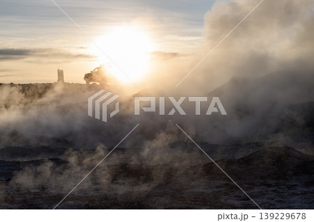 Dramatic sol de manana geothermal field with steam and sunrise 139229678