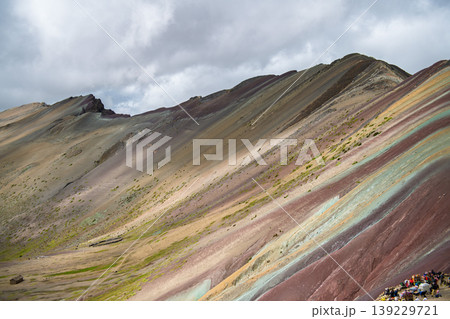 Majestic colorful mountain landscape at vinicunca creates awe under cloudy sky 139229721