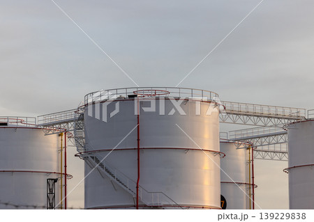 Oil storage tank, White Oil storage fuel tank with oil pipeline system in petrol industry, Oil storage tank at oil and gas refinery industrial zone. 139229838